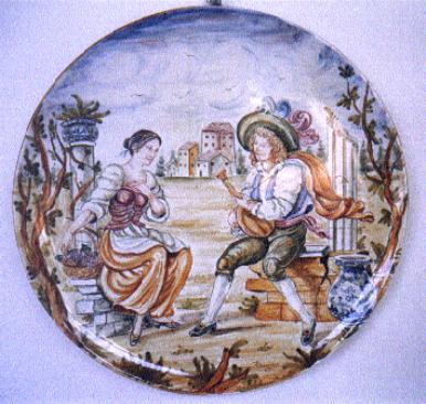 Artistic italian pottery of Albisola - Plate in majolica painted
with a scene of courtship an 18th Century period piece
